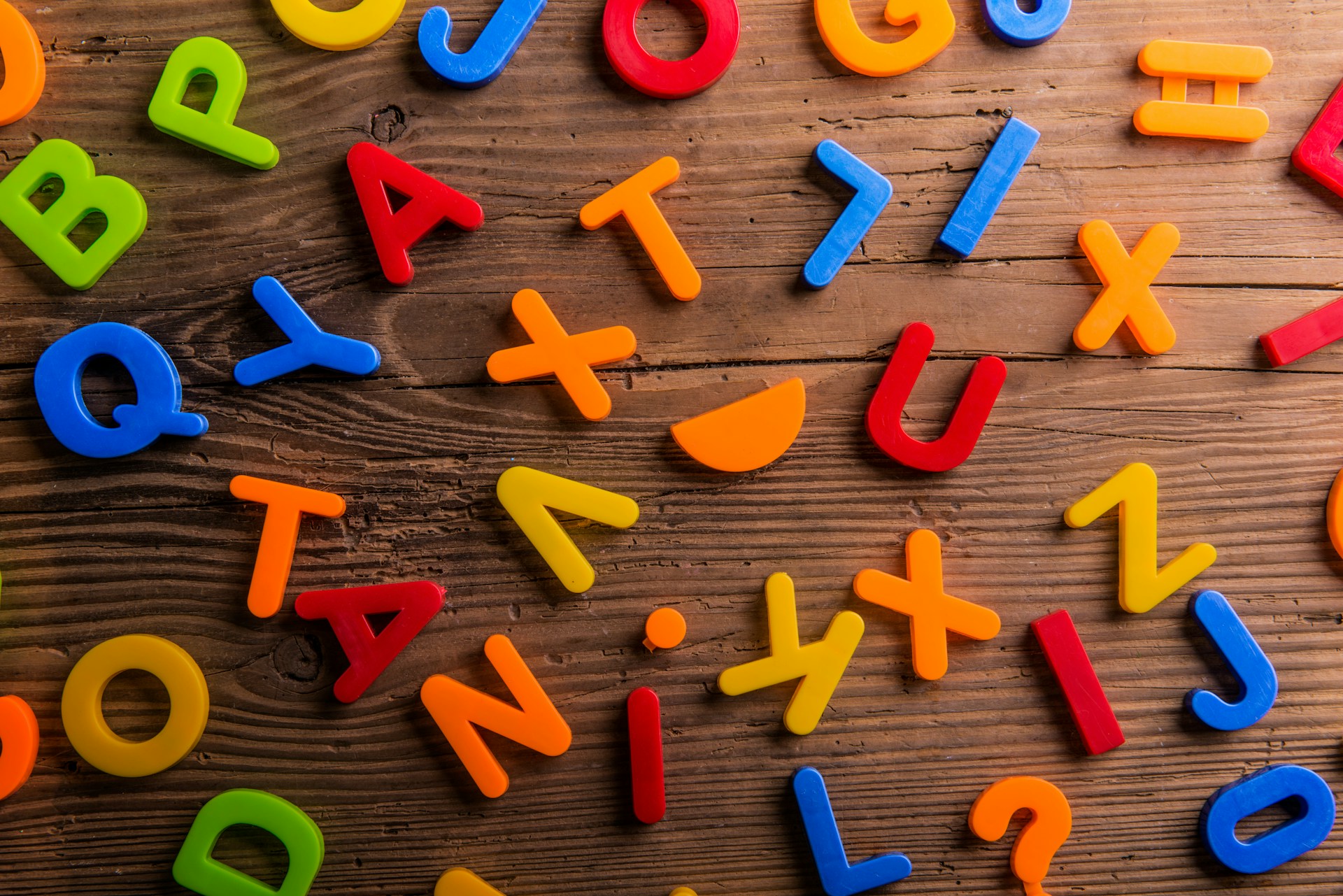 multicolored plastic letters of the alphabet