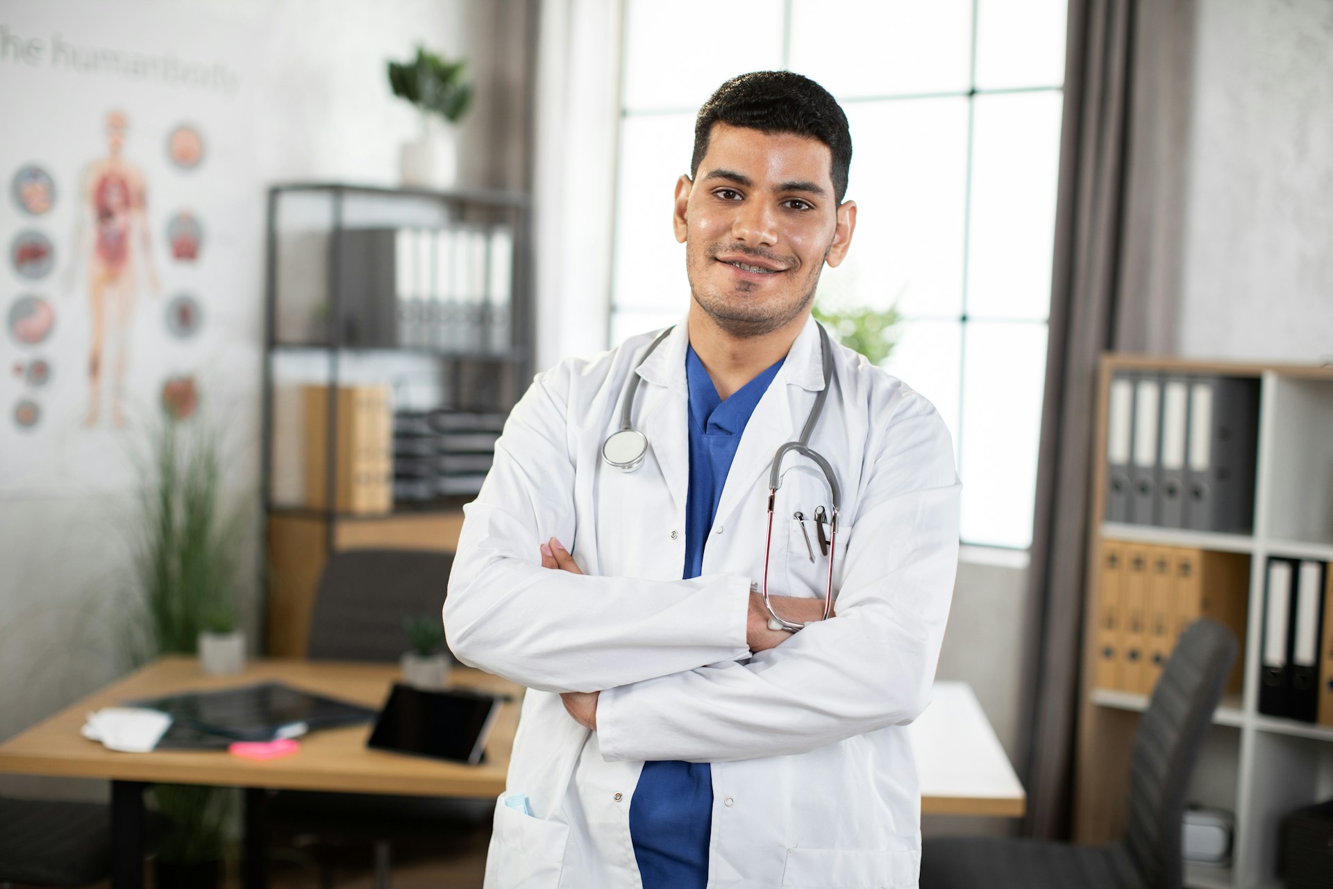 A smiling doctor in his office