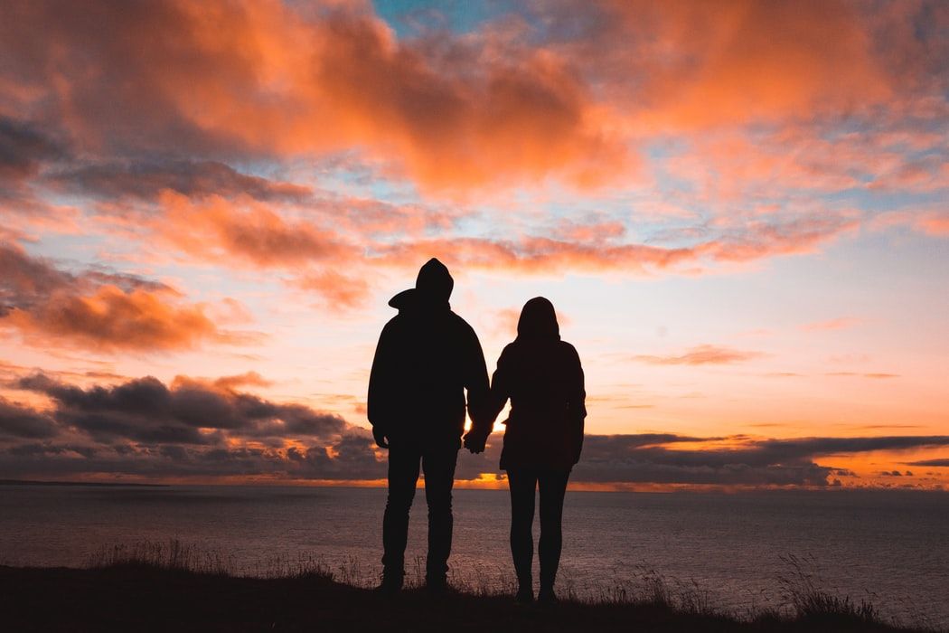 couple holding hands