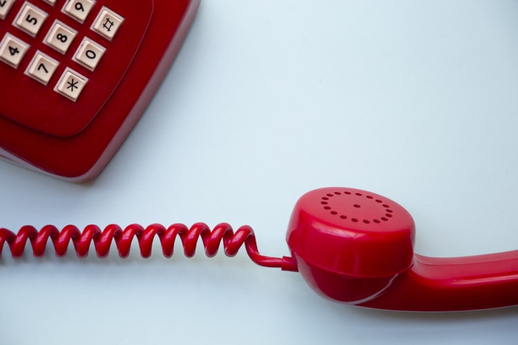a red retro land line telephone