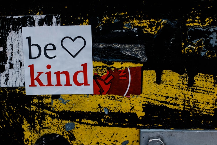 abstract art and the words 'be kind'