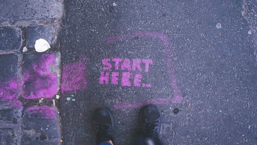 start here sprayed on path