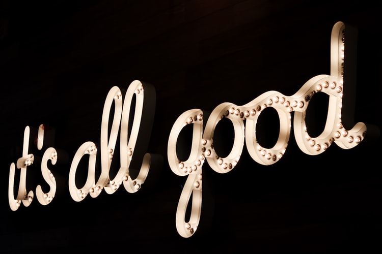 gold neon sign saying it's all good