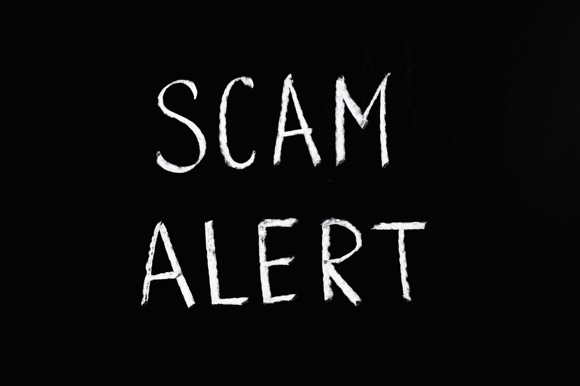 the words scam alert