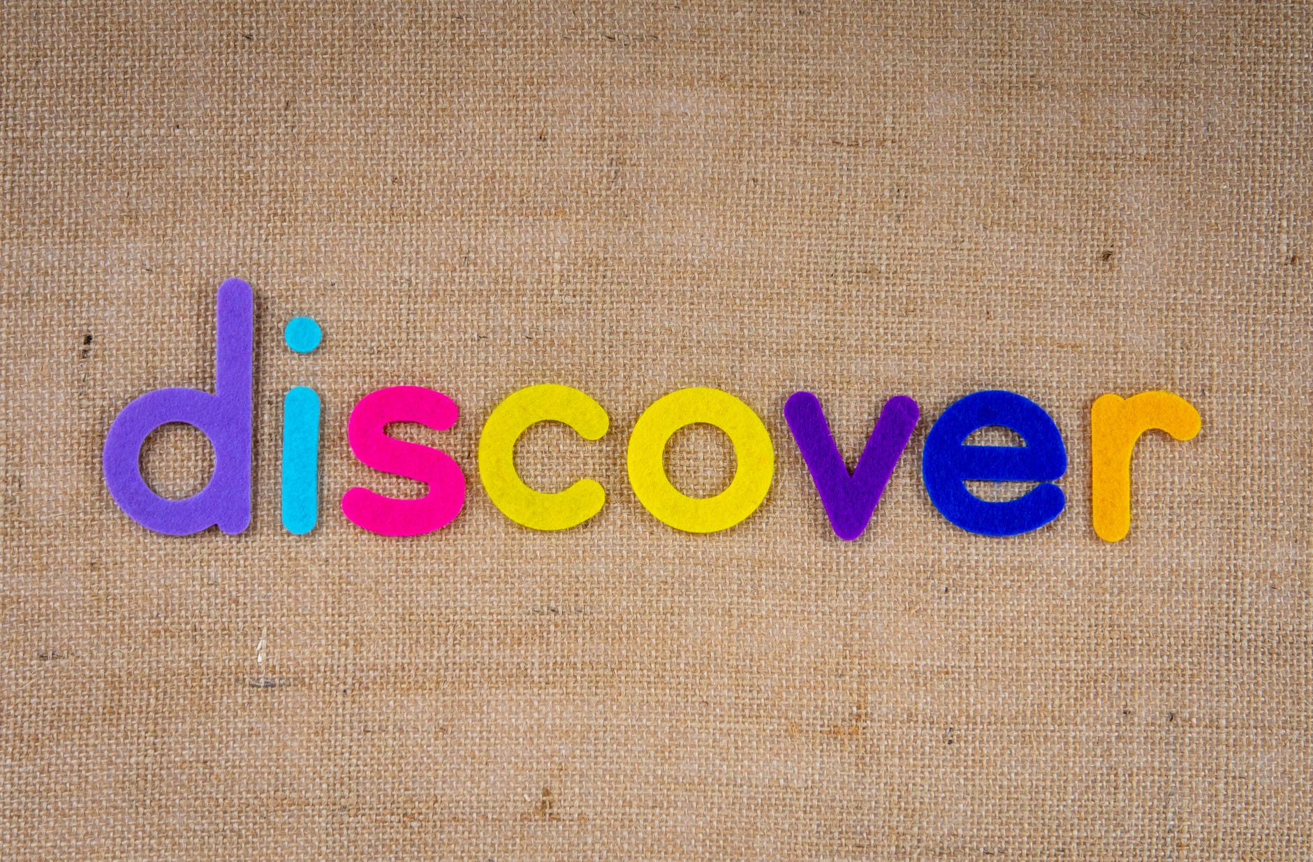 felt letters spelling 'discover'