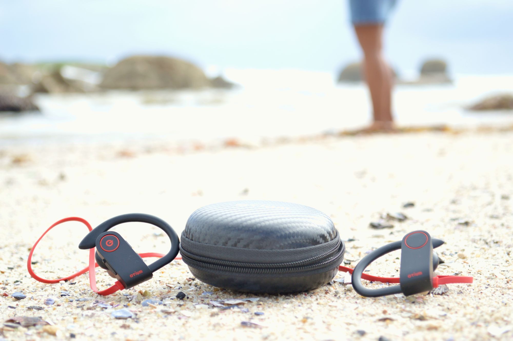 Bluetooth headphones on beach
