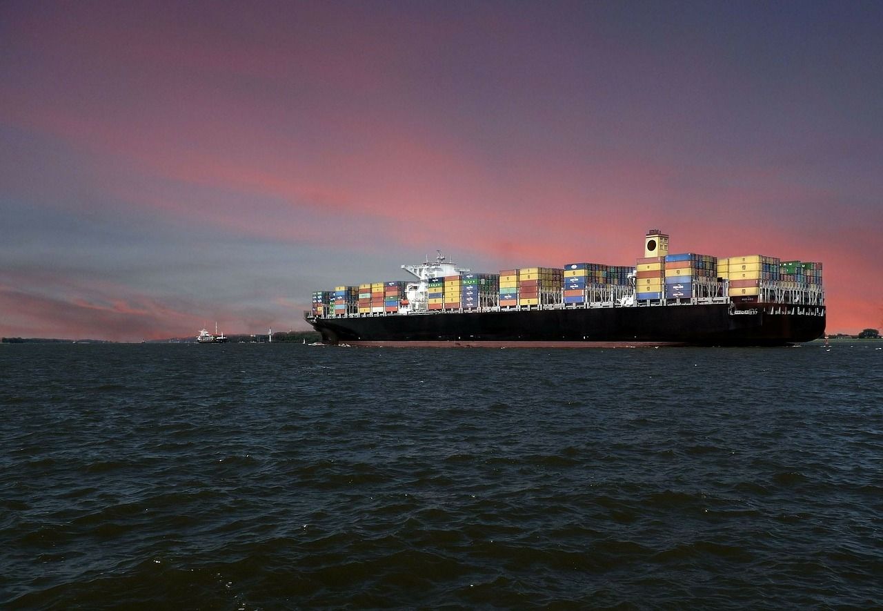 container ship at sunset