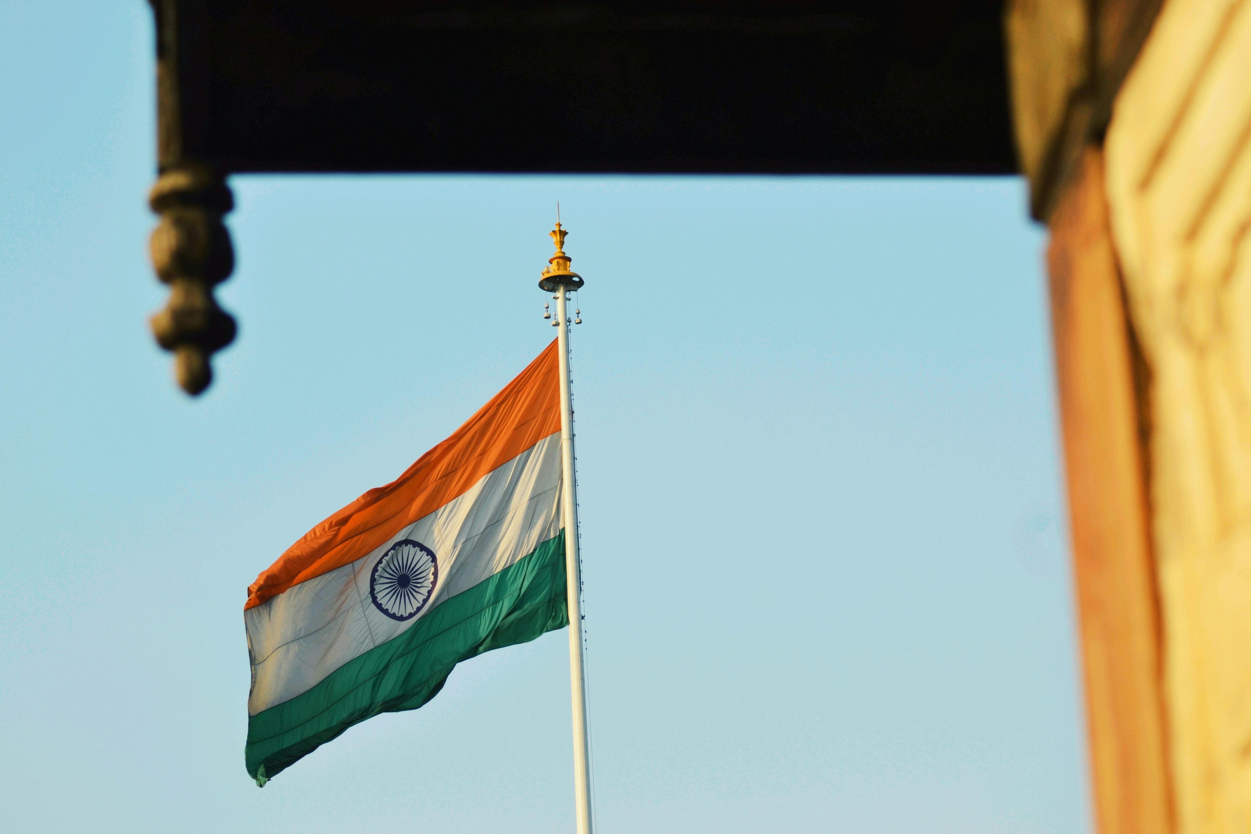 An Indian flag flying from a building